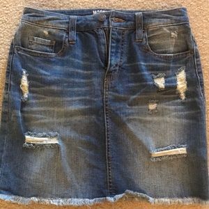 Distressed denim mini skirt